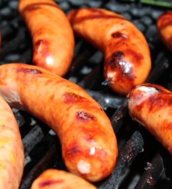 American Craft sausages grilling