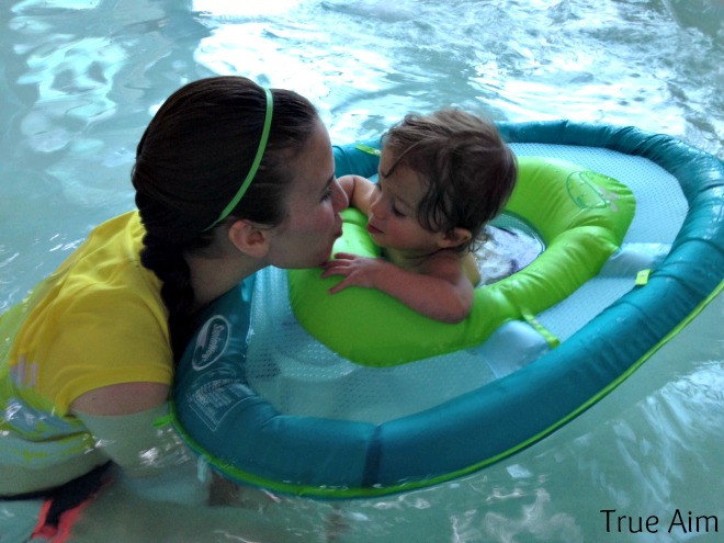 Swimming with baby in the pool